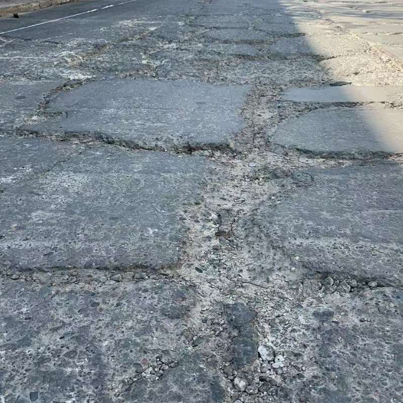 扬州路面起砂露石子修补料